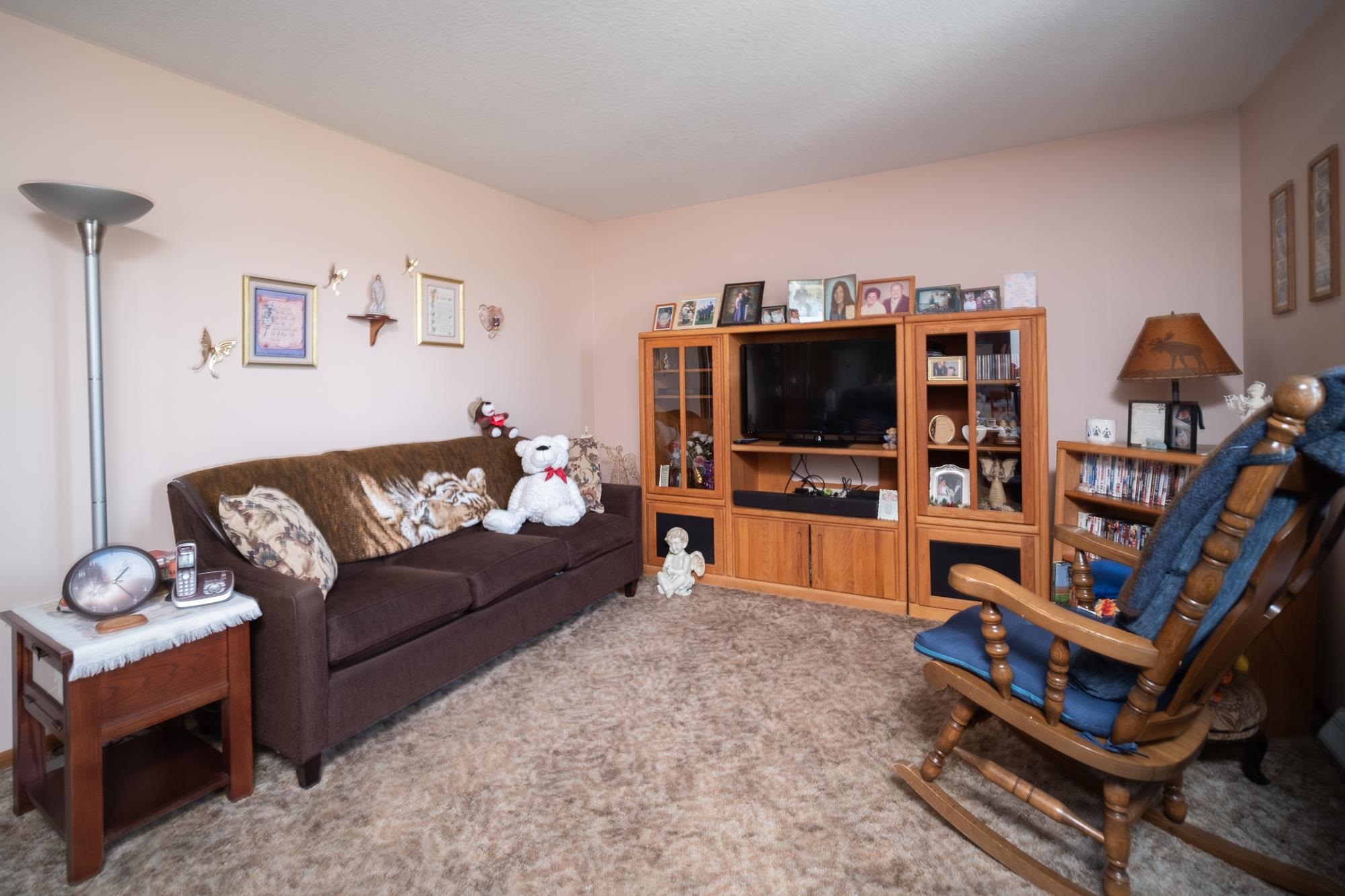 15767 Crowley Road Durand, IL 61024 - Photo 12 of 18 a living room with furniture and a flat screen tv