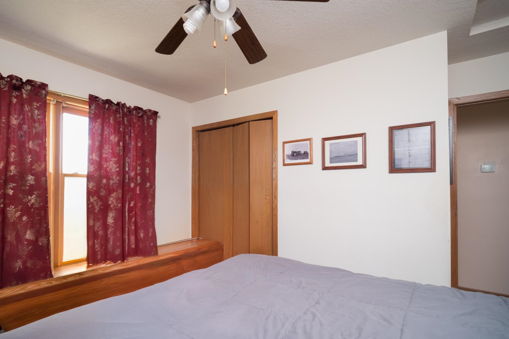 15767 Crowley Road Durand, IL 61024 - Photo 17 of 18 a bedroom with furniture and windows