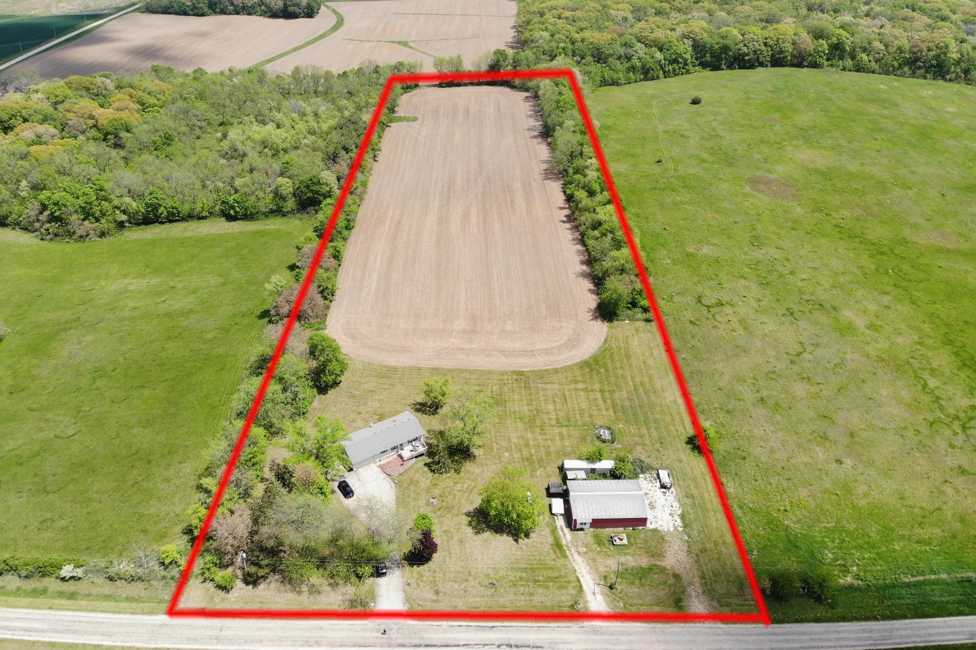 15767 Crowley Road Durand, IL 61024 - Photo 5 of 18 a view of swimming pool with a garden