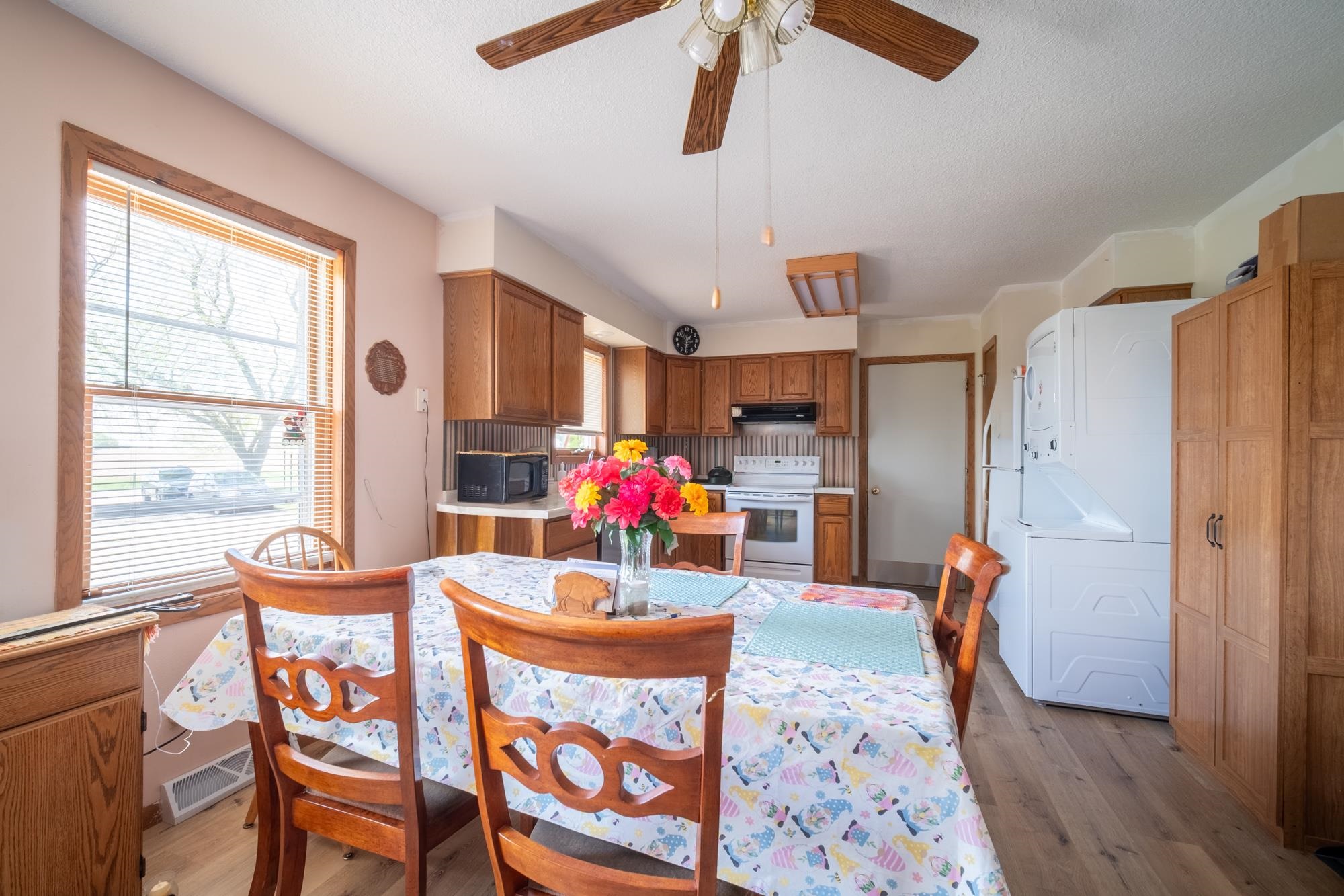 15767 Crowley Road Durand, IL 61024 - Photo 9 of 18 a view of a dining room with furniture window and wooden floor