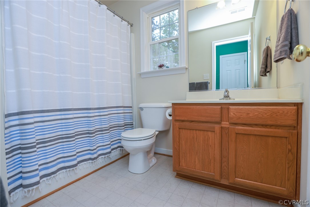 4544 Peters Creek Road Columbia, VA 23038 - Photo 39 of 50 Second level hall bathoom with vanity, tub/shower
