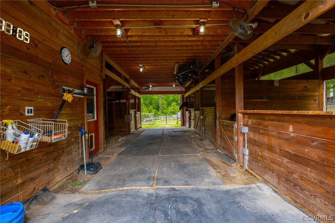 4544 Peters Creek Road Columbia, VA 23038 - Photo 4 of 50 Center Aisle Barn with lots of lighting, fans (all