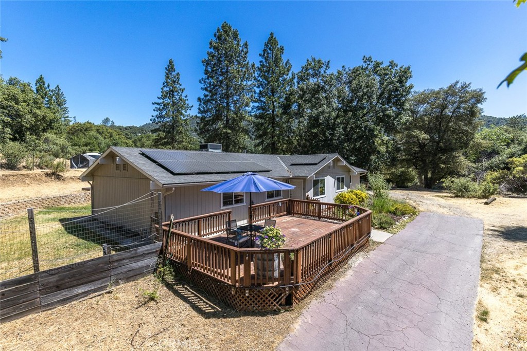 45315 Forest Ridge Drive Ahwahnee, CA 93601 - Photo 25 of 75 a view of a chairs and table in the patio