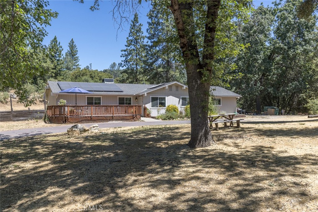 45315 Forest Ridge Drive Ahwahnee, CA 93601 - Photo 45 of 75 a view of a house with backyard and a tree