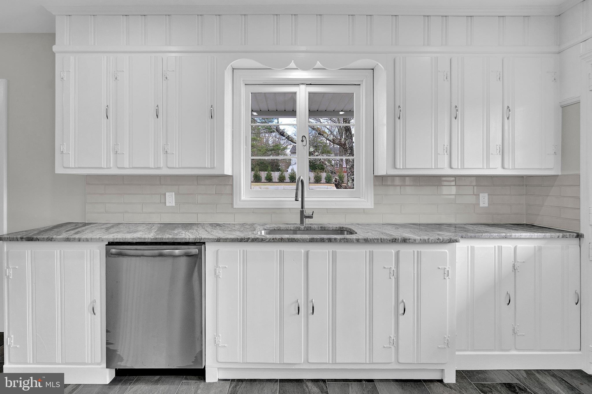 412 Washington Crossing Pennington Road Titusville, NJ 08560 - Photo 12 of 38 a kitchen with granite countertop white cabinets and sink