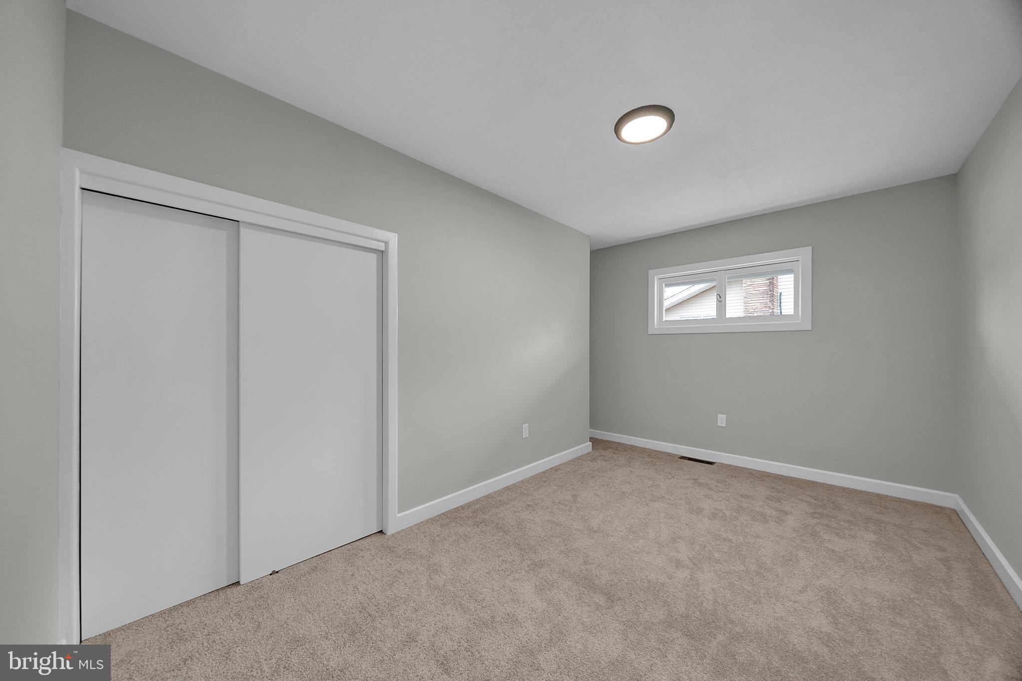 412 Washington Crossing Pennington Road Titusville, NJ 08560 - Photo 23 of 38 a view of an empty room with windows and closet