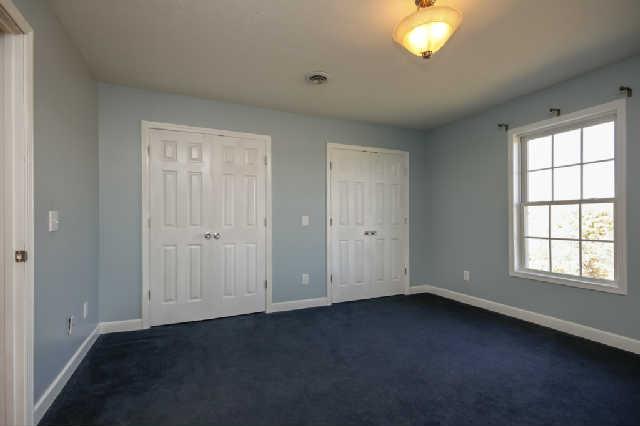 296 Ernest Cates Road Bethpage, TN 37022 - Photo 13 of 20 Carpeted bedroom w/ access to full bath