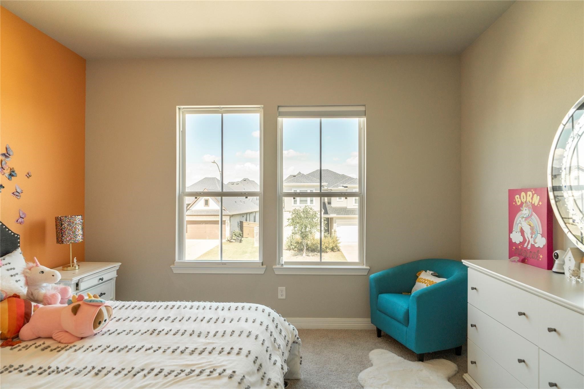 29023 Laurel Grove Lane Fulshear, TX 77441 - Photo 20 of 42 a bedroom with a bed and a window