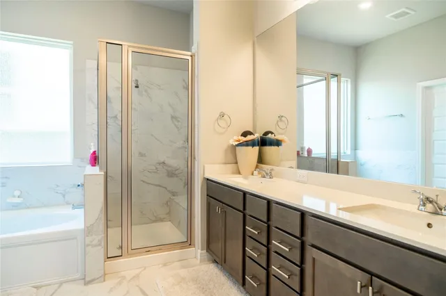 a bathroom with a sink and a bathtub