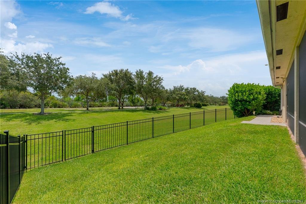 2185 Northwest Dalea Way Stuart, FL 34994 - Photo 38 of 55 a view of a garden with a large trees