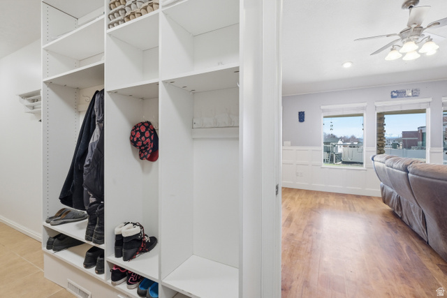 860 West 2980th Street South Logan, UT 84321 - Photo 13 of 38 Built-in white shelving system featuring adjustable shelves and hanging rods