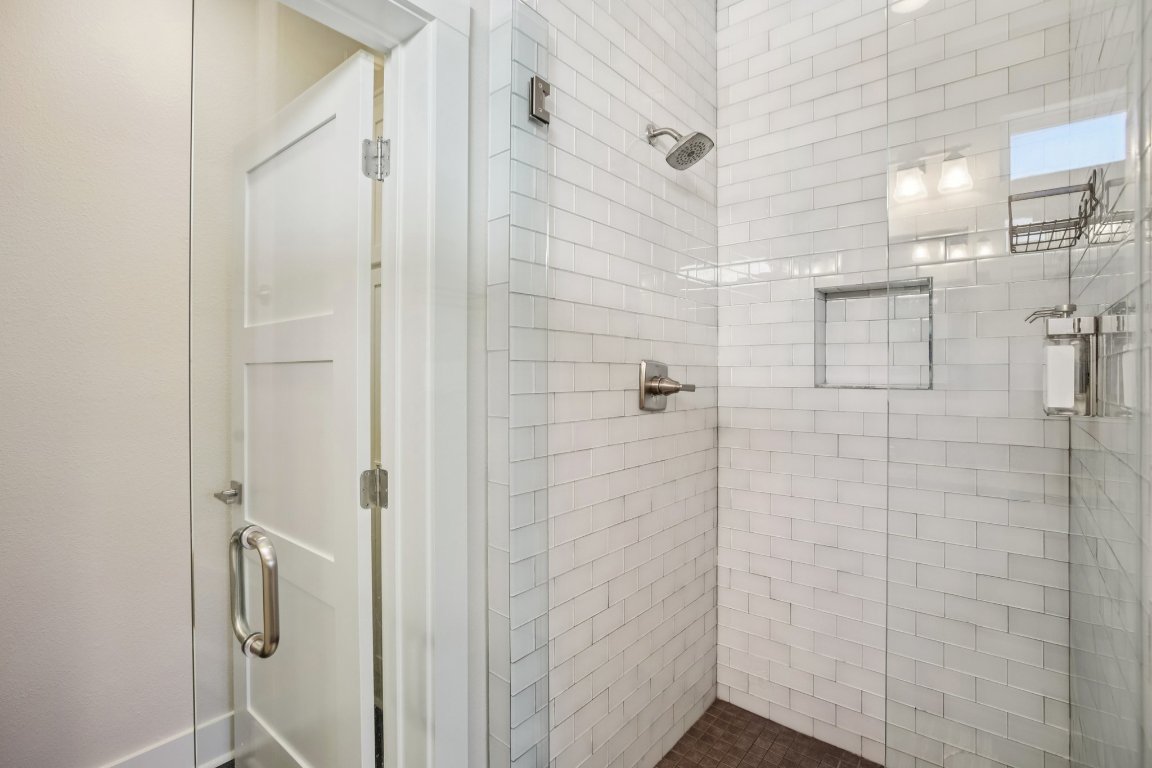 1206 Deloney Street, Unit B Austin, TX 78721 - Photo 17 of 39 Full bathroom featuring a shower stall