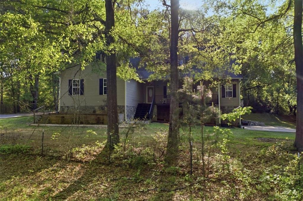 164 Laurens Road Rockmart, GA 30153 - Photo 2 of 41 a view of a house with a yard