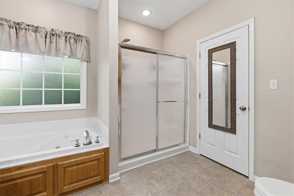 164 Laurens Road Rockmart, GA 30153 - Photo 22 of 41 a bathroom with a sink and a mirror