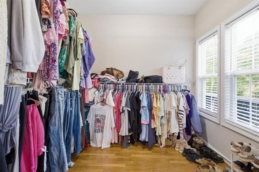 164 Laurens Road Rockmart, GA 30153 - Photo 23 of 41 a view of walk in closet with clothes