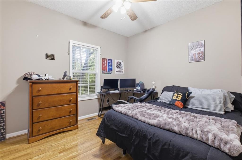 164 Laurens Road Rockmart, GA 30153 - Photo 27 of 41 a bedroom with a bed and furniture
