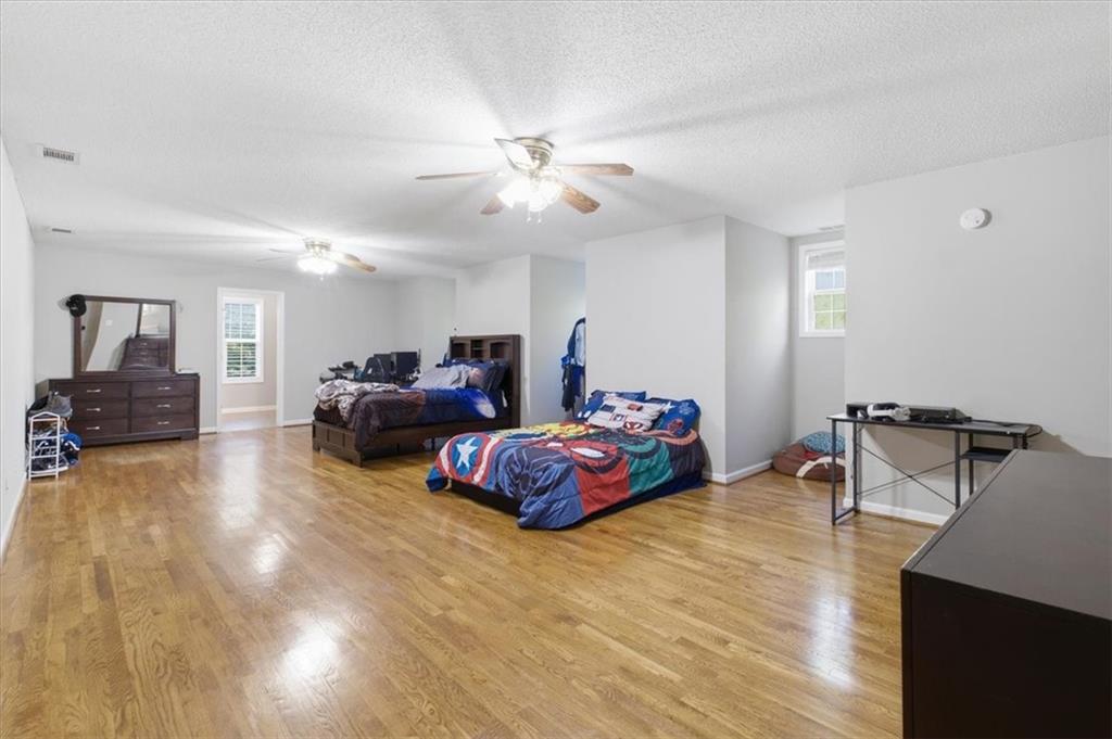 164 Laurens Road Rockmart, GA 30153 - Photo 28 of 41 a living room with furniture and a chandelier