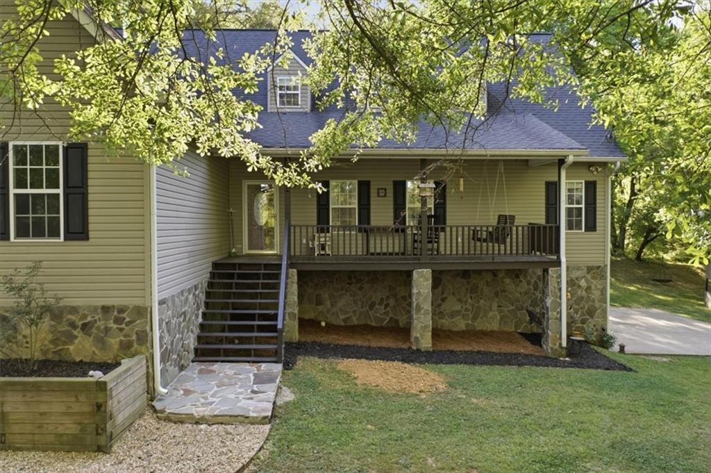 164 Laurens Road Rockmart, GA 30153 - Photo 3 of 41 a front view of a house with a garden