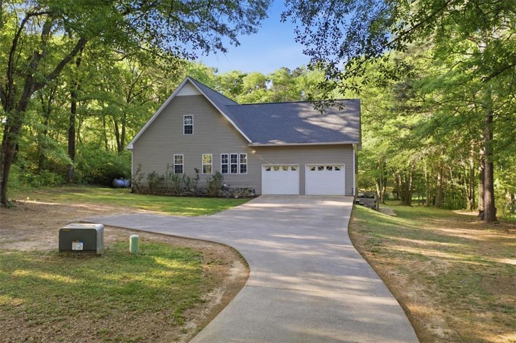 164 Laurens Road Rockmart, GA 30153 - Photo 5 of 41 a view of a house with a yard