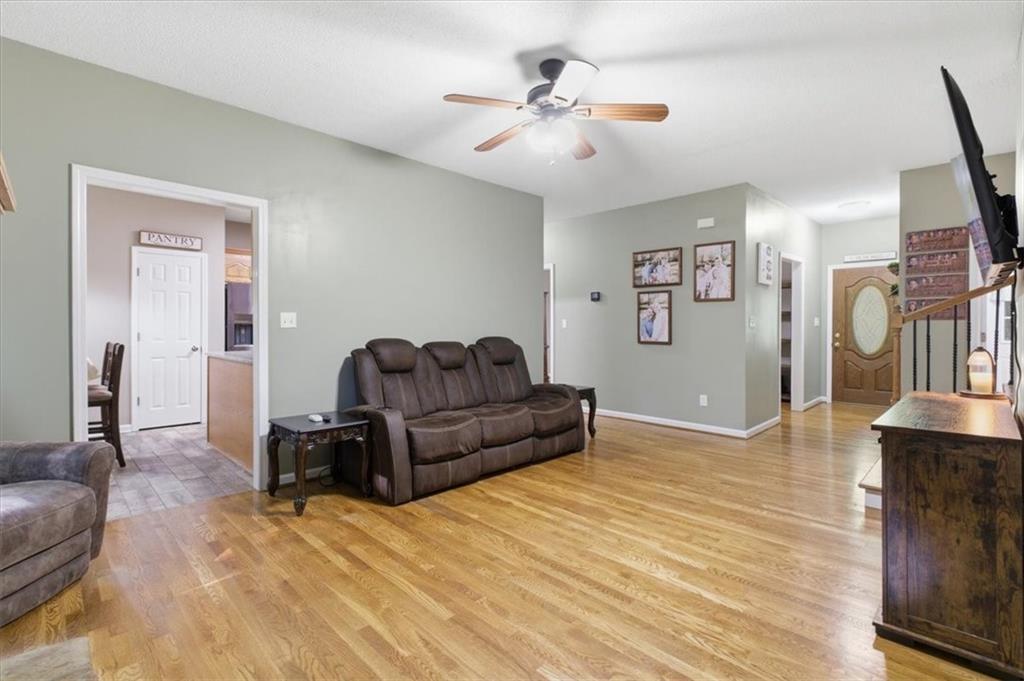 164 Laurens Road Rockmart, GA 30153 - Photo 10 of 41 a living room with furniture and a chandelier