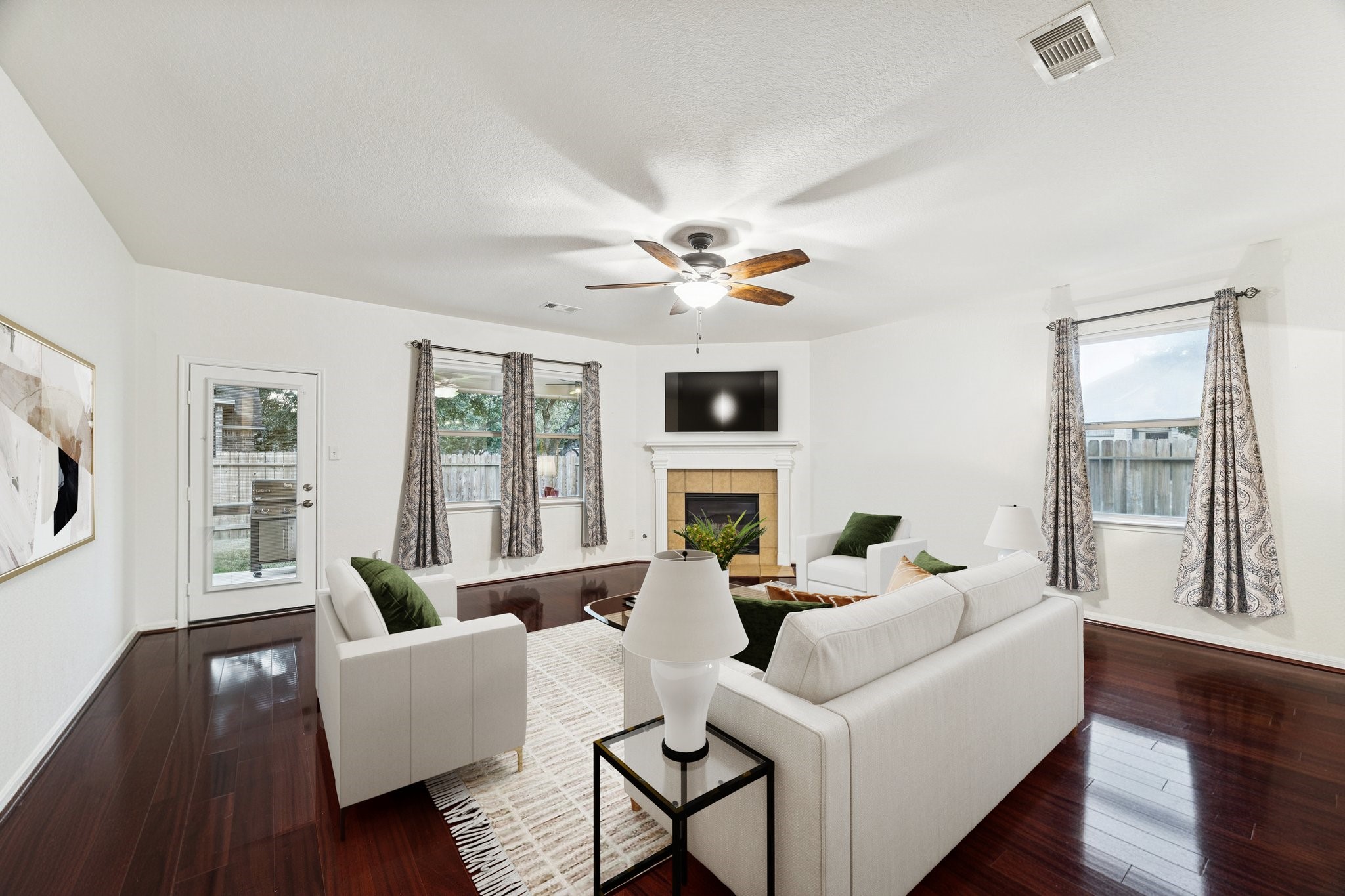 191 Maple Grove Drive Conroe, TX 77384 - Photo 4 of 27 Enjoy family time in the spacious living room with a gas log fireplace. (Virtually staged).