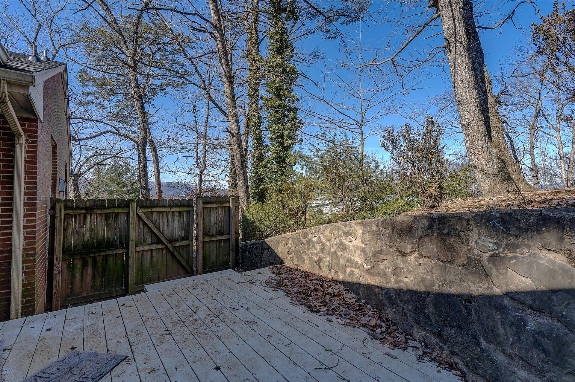 3026 Sedgefield Road Southwest Roanoke, VA 24018 - Photo 23 of 25 a view of a balcony with wooden floor and fence