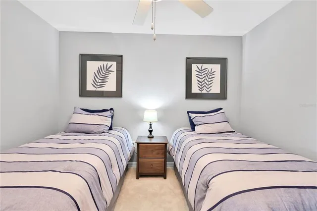 a bedroom with bed and a window