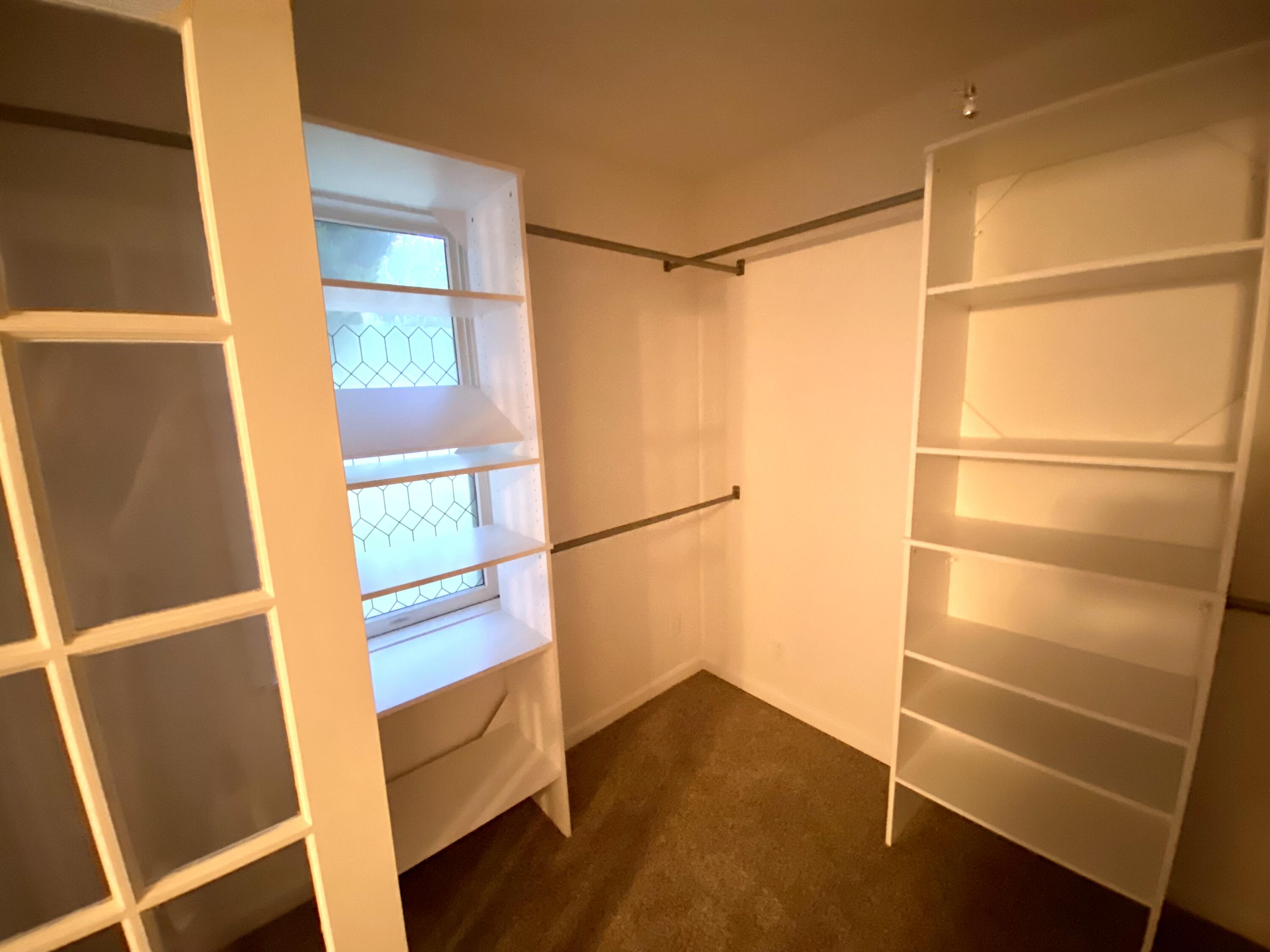 4985 Maple Road Manistee, MI 49660 - Photo 13 of 28 Closet with built ins
