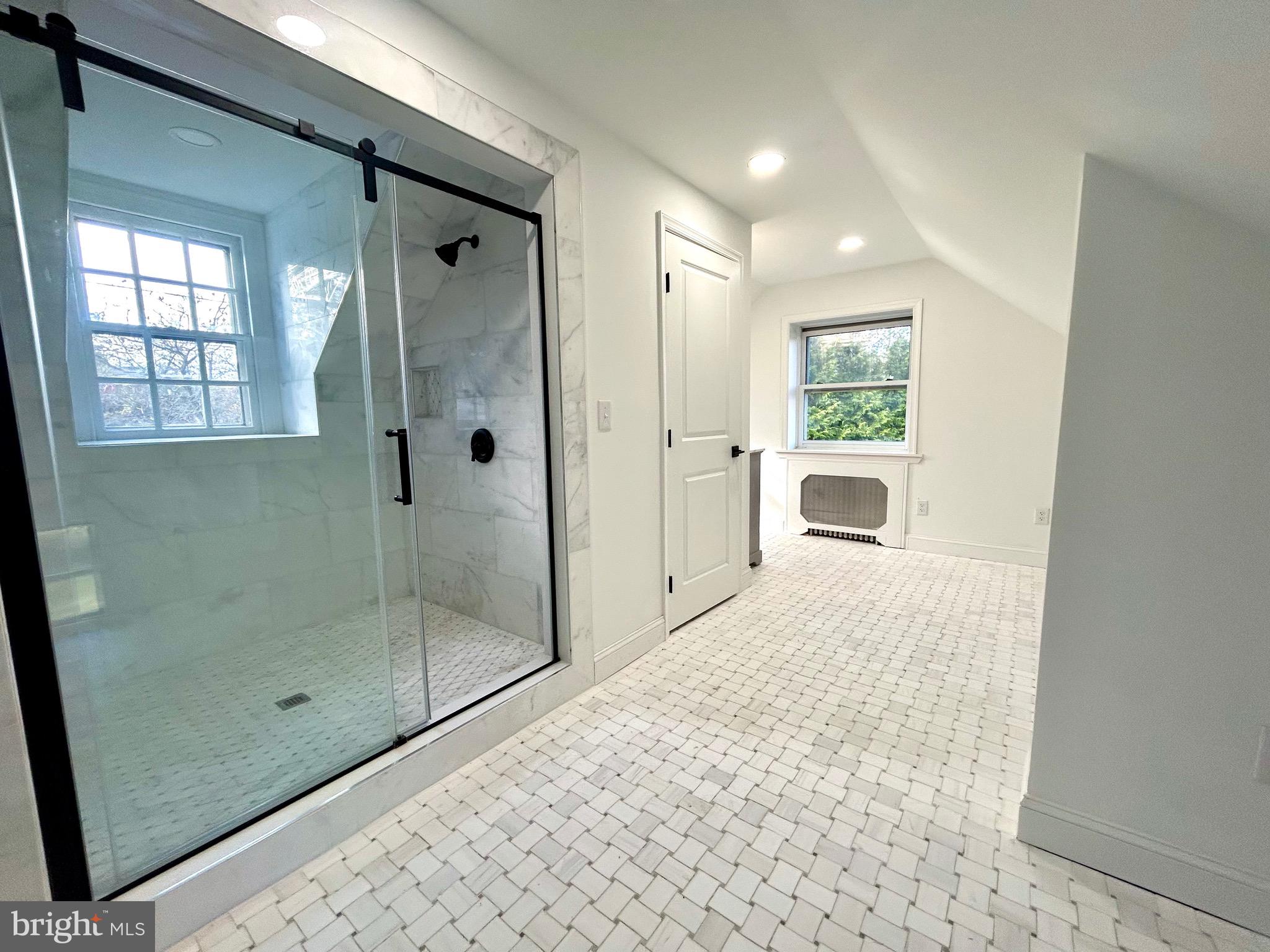 571 North Newtown Street Road Newtown Square, PA 19073 - Photo 14 of 25 a bathroom with a shower and a sink