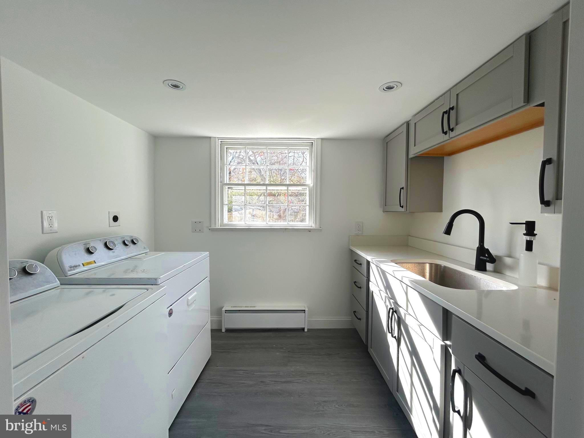 571 North Newtown Street Road Newtown Square, PA 19073 - Photo 22 of 25 a kitchen that has a sink and a stove