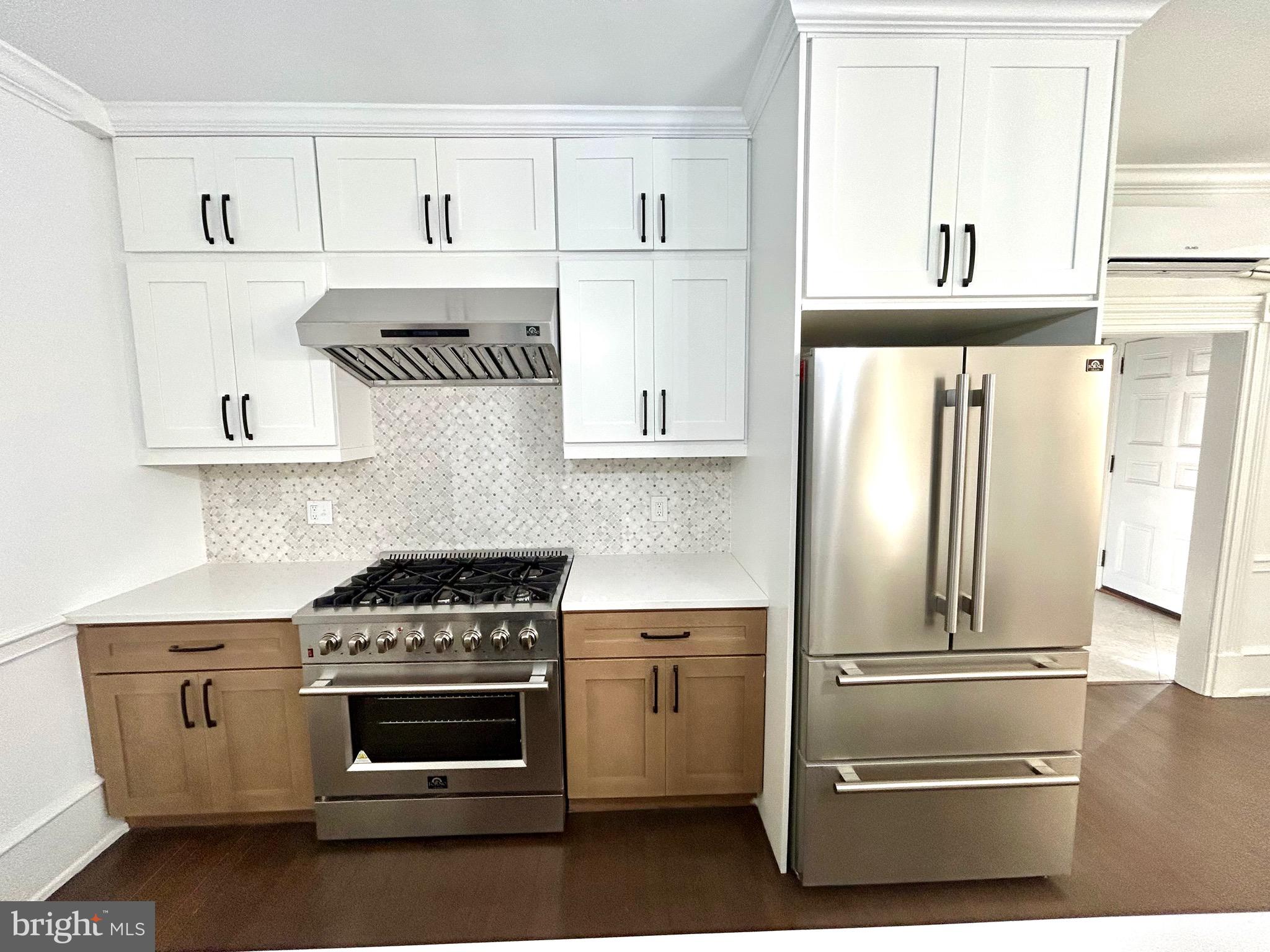 571 North Newtown Street Road Newtown Square, PA 19073 - Photo 6 of 25 a kitchen with cabinets and stainless steel appliances