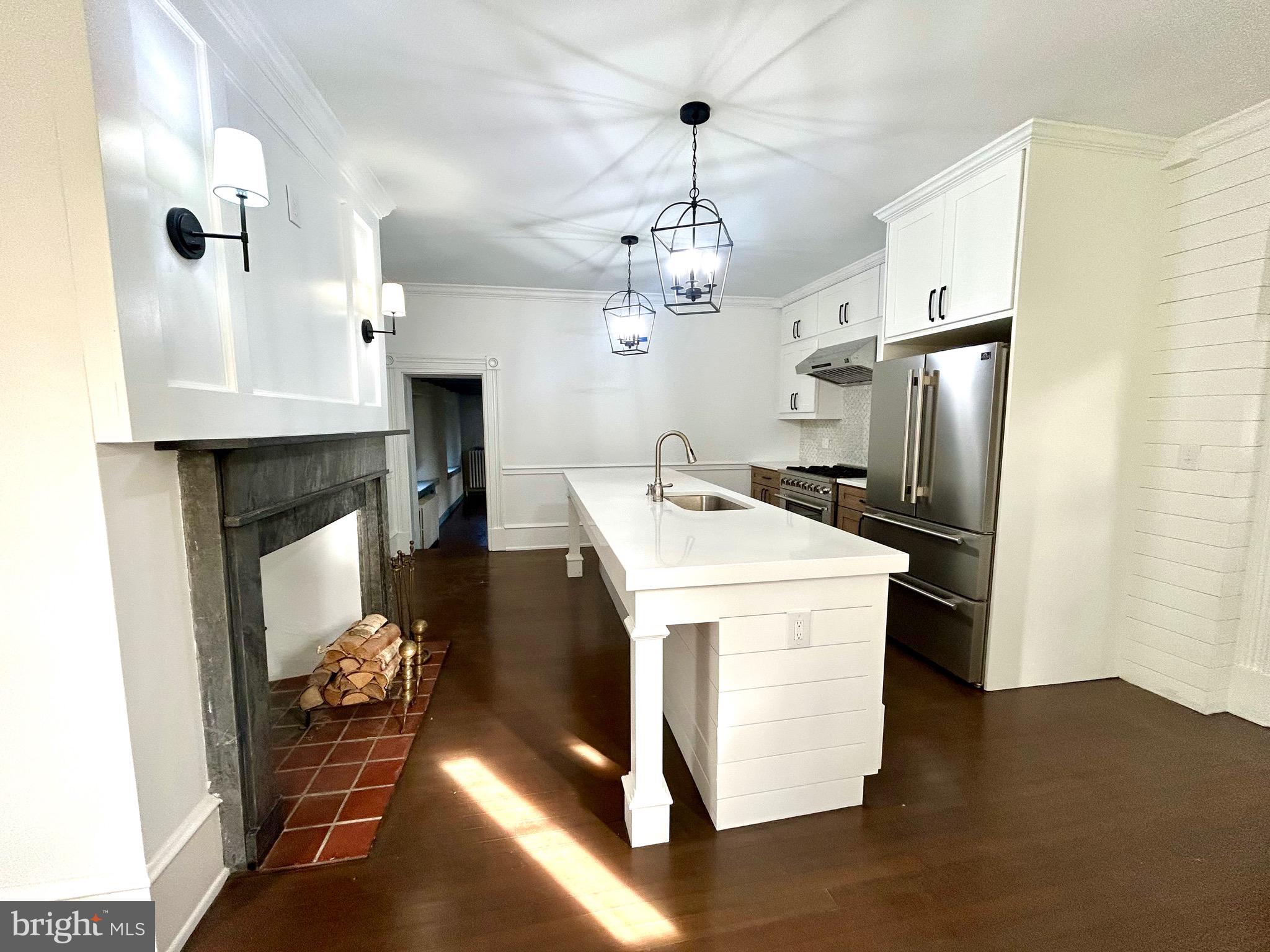571 North Newtown Street Road Newtown Square, PA 19073 - Photo 7 of 25 a kitchen that has a lot of cabinets and refrigerator