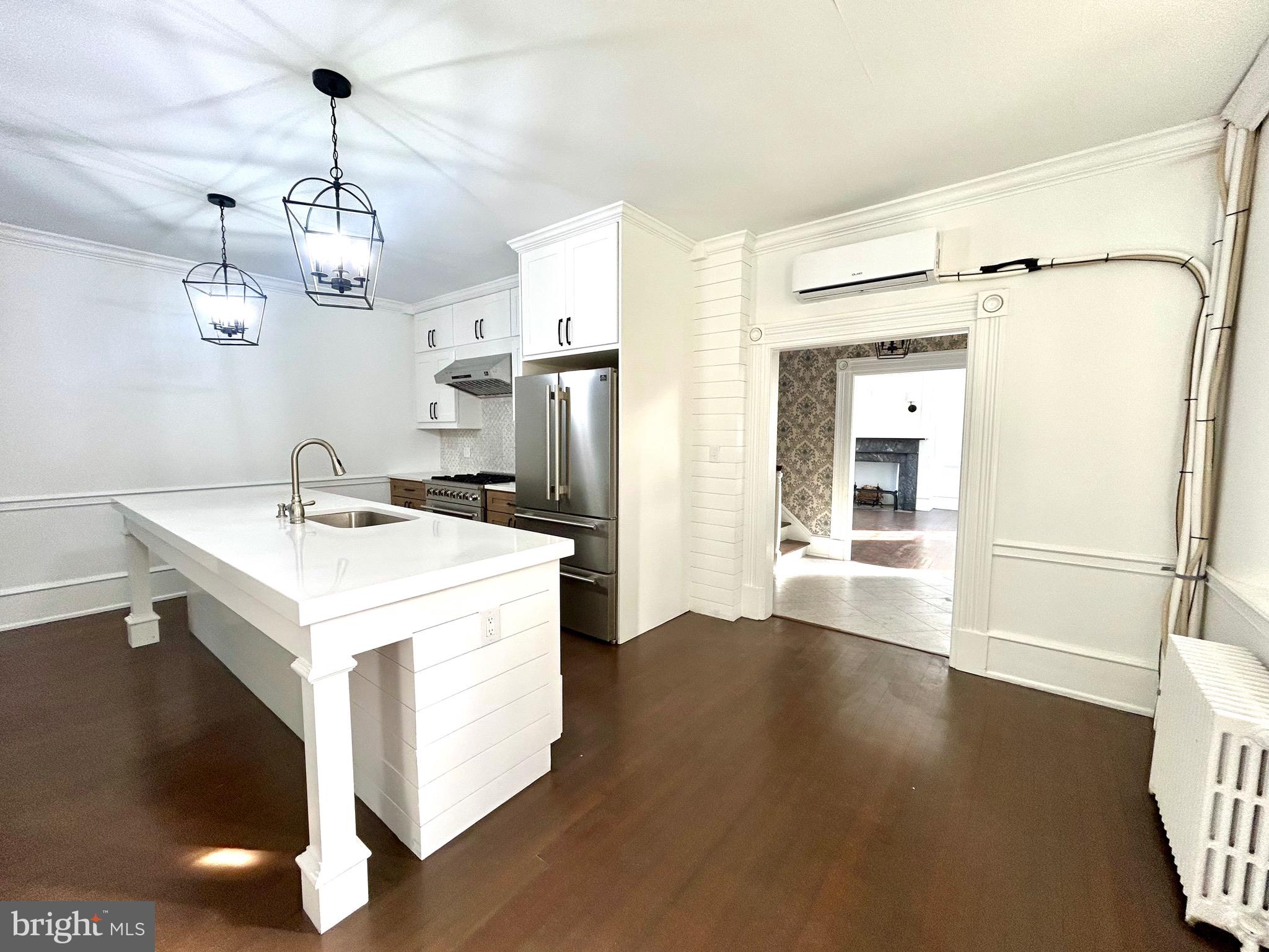571 North Newtown Street Road Newtown Square, PA 19073 - Photo 8 of 25 a kitchen that has a refrigerator a stove and a sink