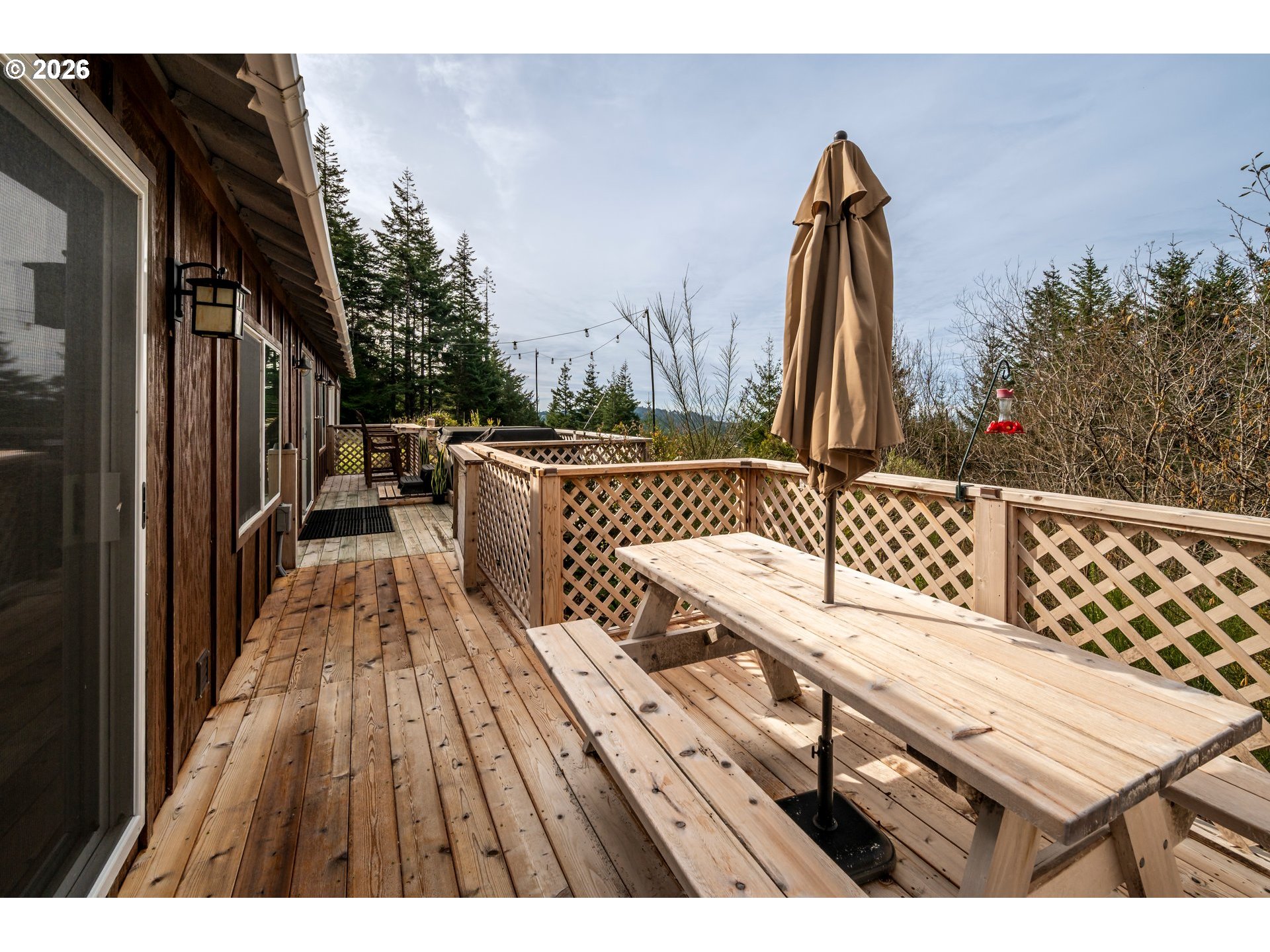 42365 Hensley Hill Road Port Orford, OR 97465 - Photo 12 of 47 a view of outdoor space with a table and chairs