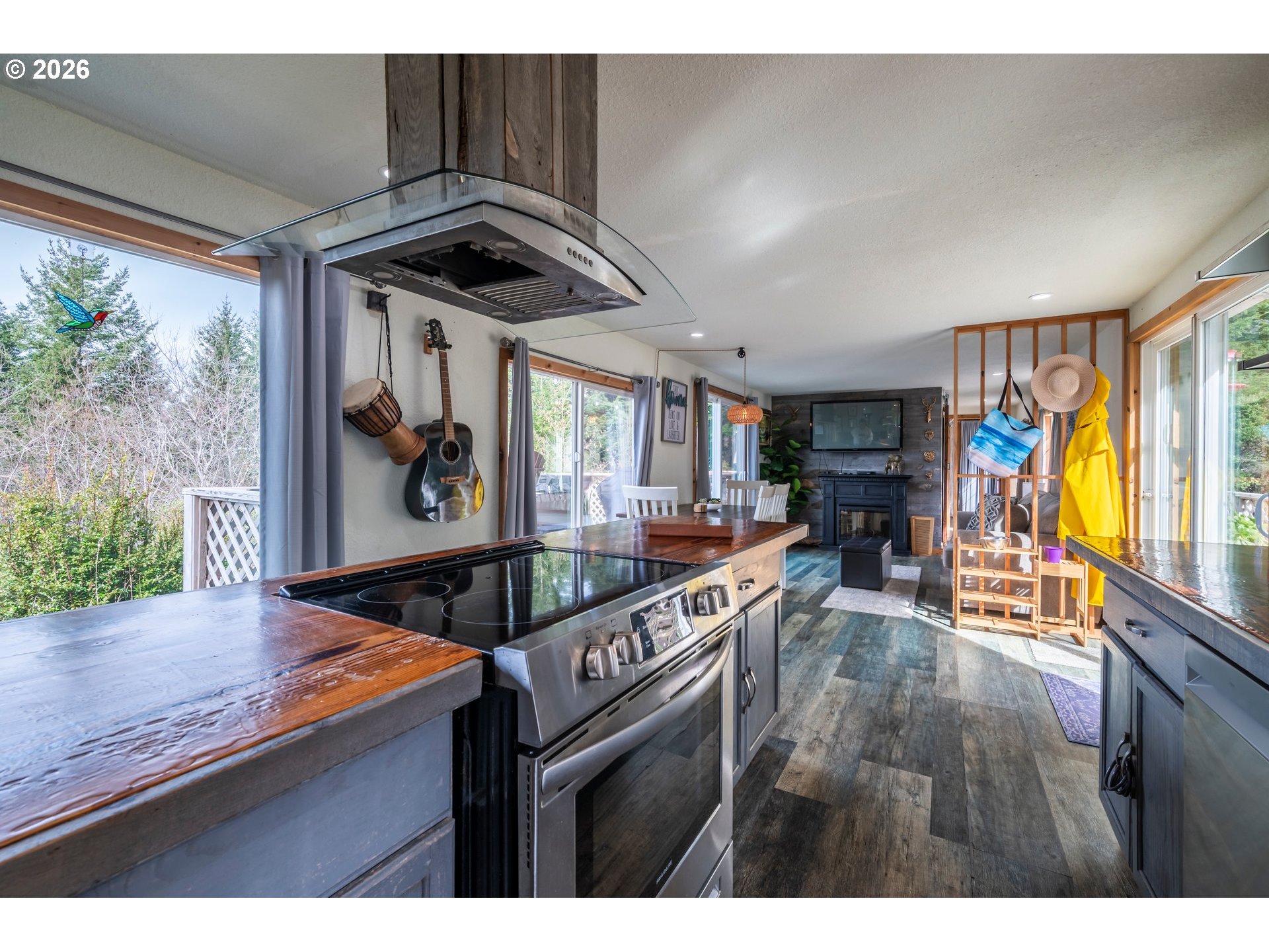 42365 Hensley Hill Road Port Orford, OR 97465 - Photo 19 of 47 a living room with furniture and a flat screen tv