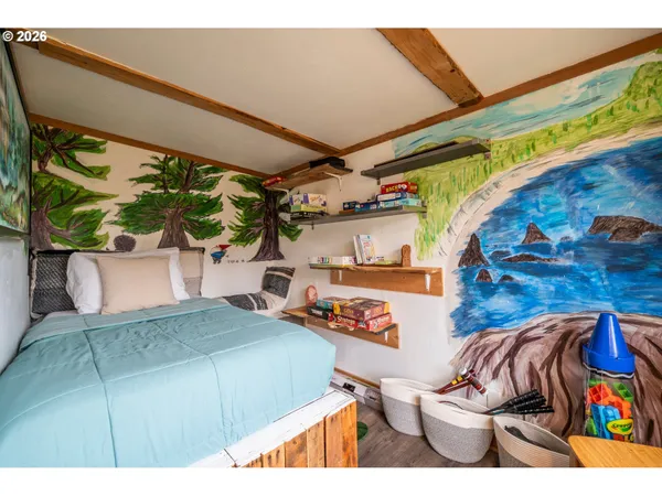 a bed room with a bed and a couch