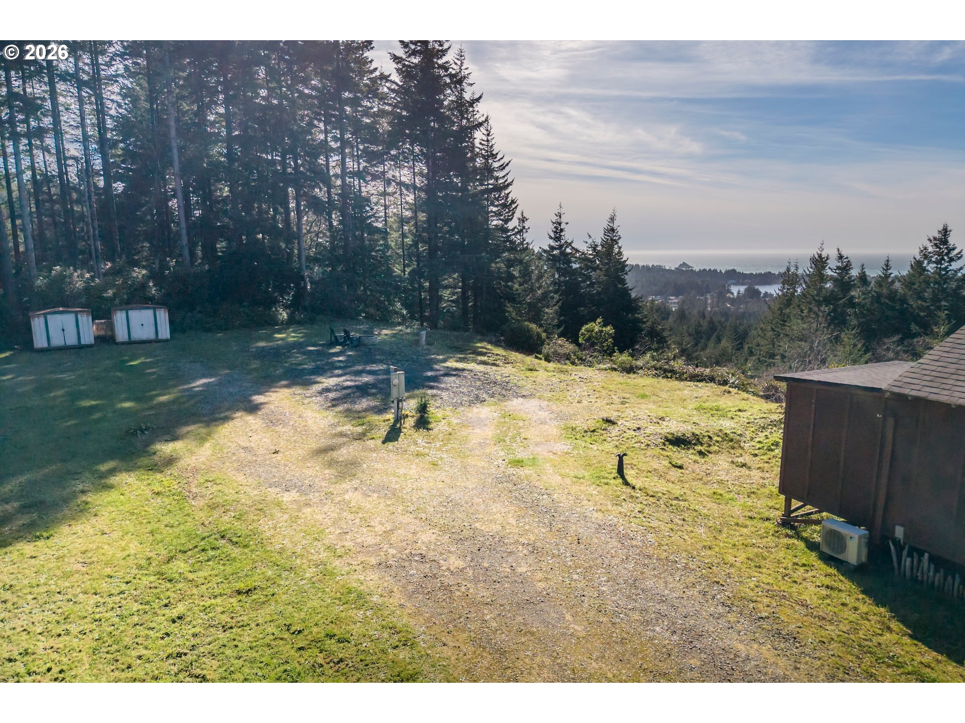 42365 Hensley Hill Road Port Orford, OR 97465 - Photo 4 of 47 a view of swimming pool with a yard and outdoor seating