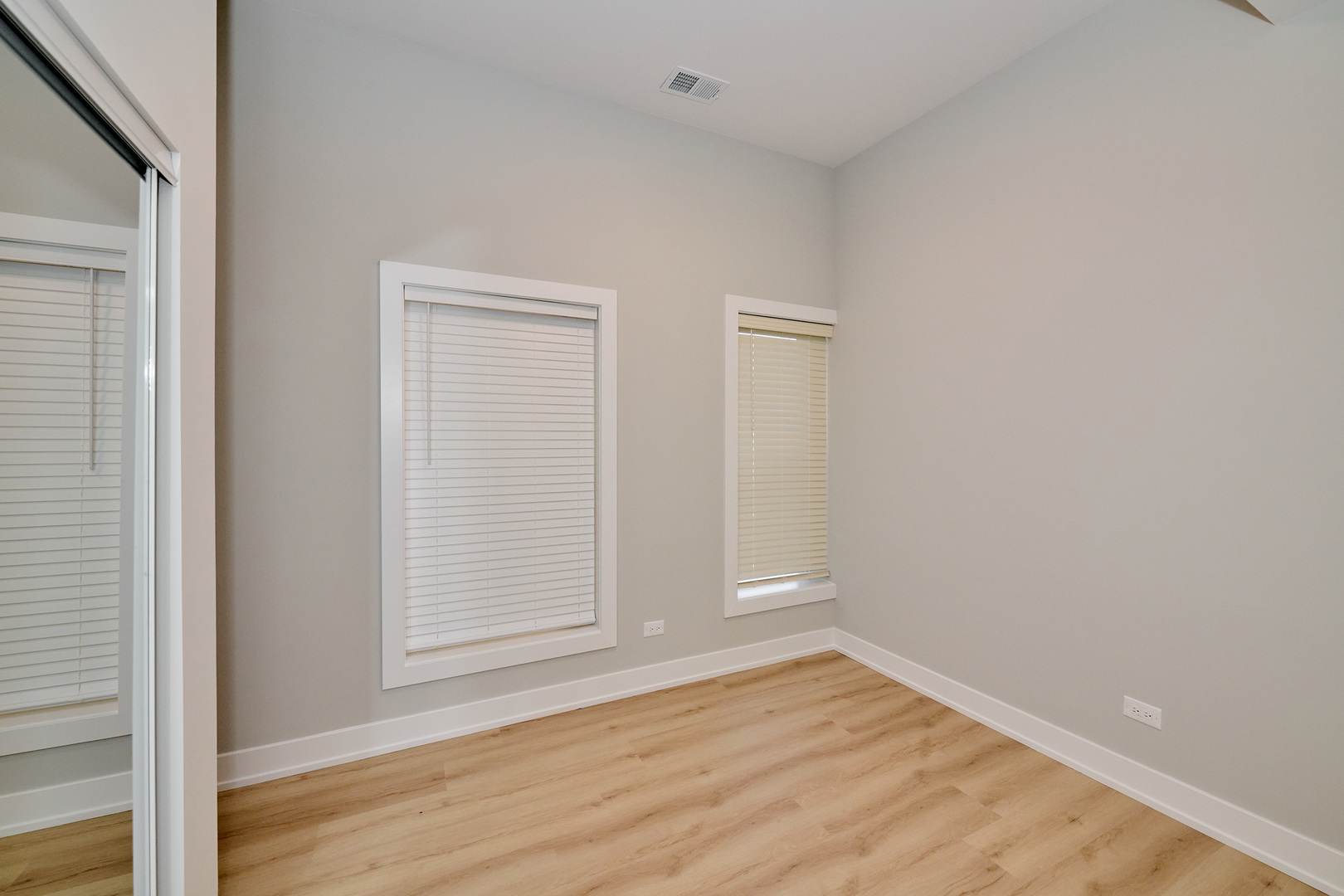 2868 West 21st Place, Unit 1 Chicago, IL 60623 - Photo 11 of 17 wooden floor in an empty room