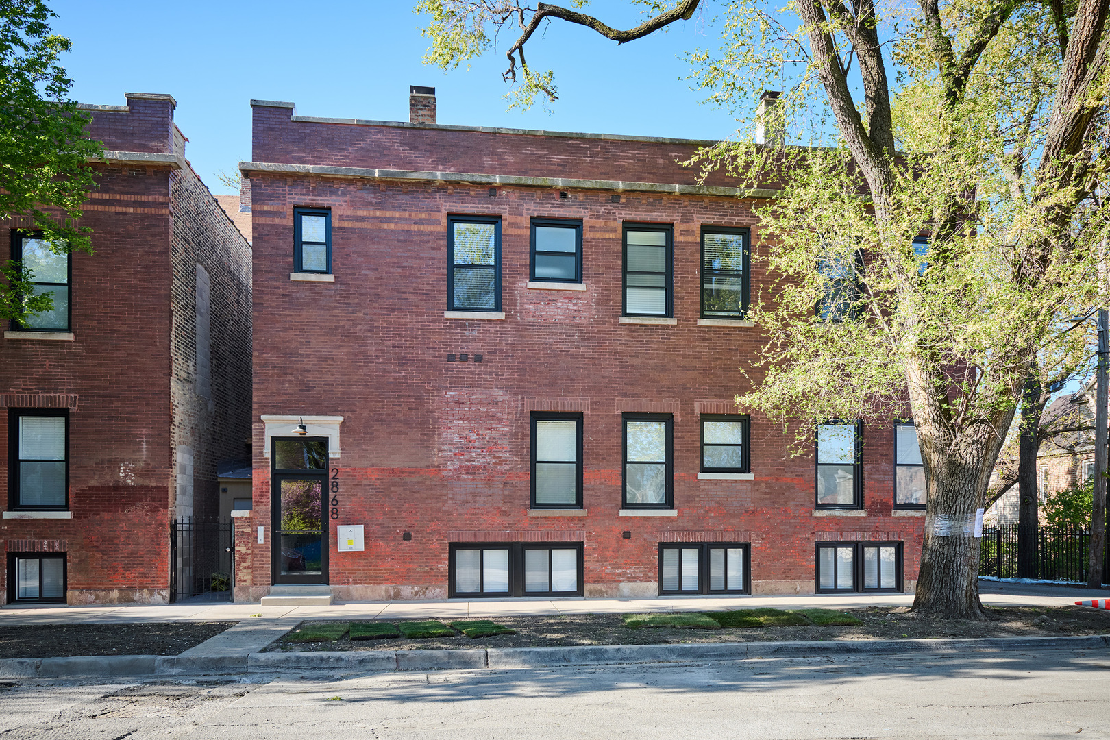 2868 West 21st Place, Unit 1 Chicago, IL 60623 - Photo 17 of 17 a front view of residential houses