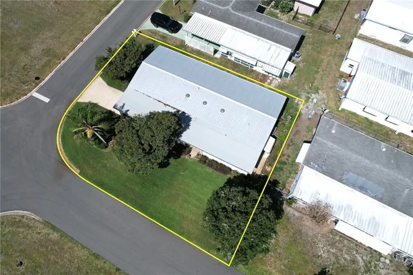 an aerial view of a house with a garden