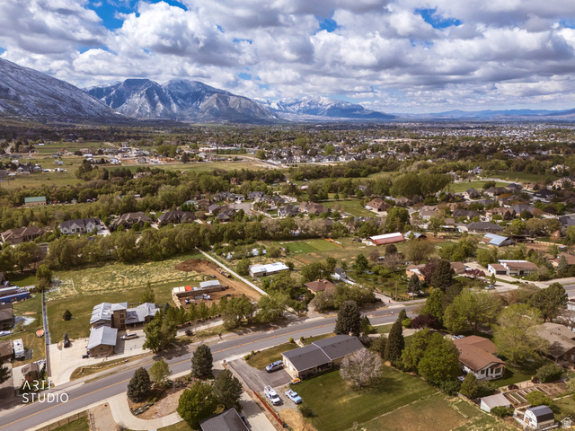 2672 East Canyon Road Springville, UT 84663 - Photo 20 of 33 Aerial perspective of suburban area featuring a mountainous background