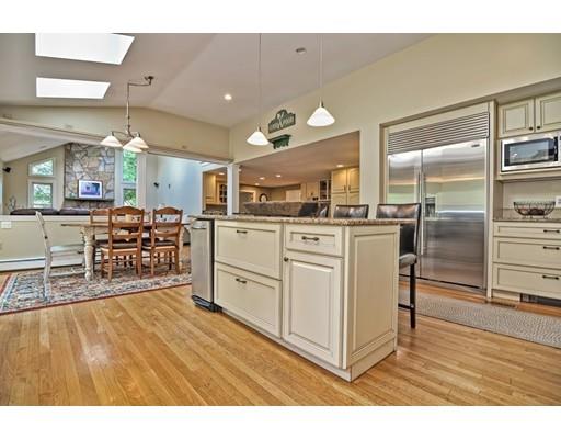 17 Deerfield Drive Medfield, MA 02052 - Photo 11 of 42 a kitchen with stainless steel appliances granite countertop a stove top oven a sink and a refrigerator
