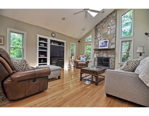 17 Deerfield Drive Medfield, MA 02052 - Photo 16 of 42 a living room with furniture and a fireplace