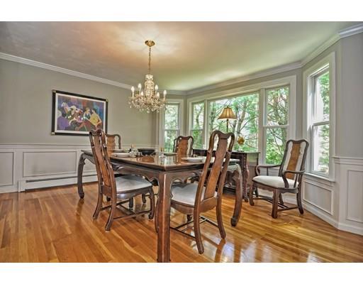 17 Deerfield Drive Medfield, MA 02052 - Photo 19 of 42 a view of a dining room with furniture wooden floor and chandelier
