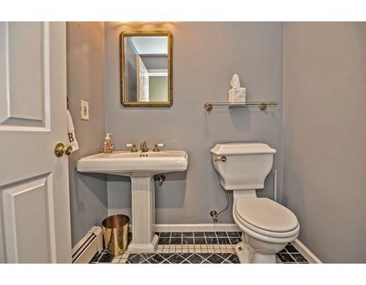 17 Deerfield Drive Medfield, MA 02052 - Photo 22 of 42 a bathroom with a toilet a sink and mirror