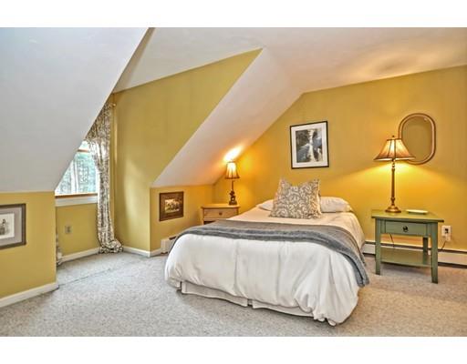 17 Deerfield Drive Medfield, MA 02052 - Photo 34 of 42 a bedroom with a bed and wooden floor