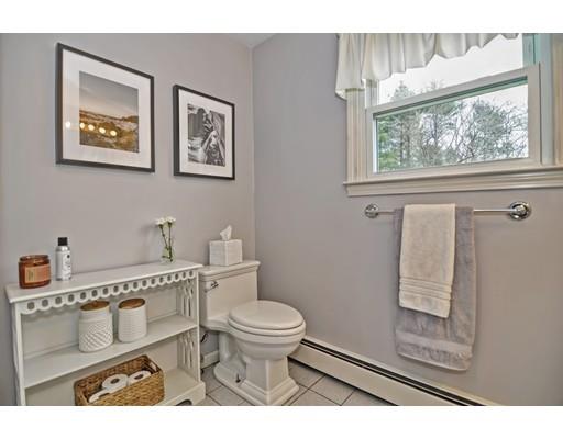 17 Deerfield Drive Medfield, MA 02052 - Photo 35 of 42 a bathroom with a toilet a sink and a window