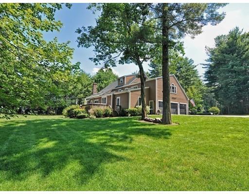 17 Deerfield Drive Medfield, MA 02052 - Photo 40 of 42 a view of a house with a big yard potted plants and large tree