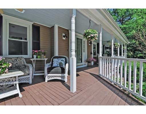 17 Deerfield Drive Medfield, MA 02052 - Photo 6 of 42 a balcony with table and chairs
