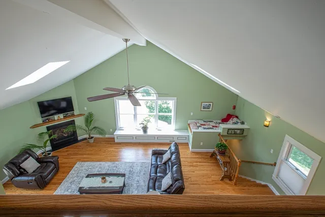 a room with furniture and a flat screen tv